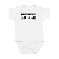 White baby onesie with text design on a white background