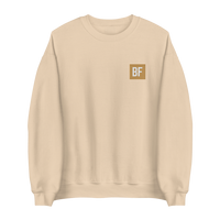 A light beige crewneck sweatshirt with a small square tan chest logo containing the letters 'BF' in white, shown on a plain white background.